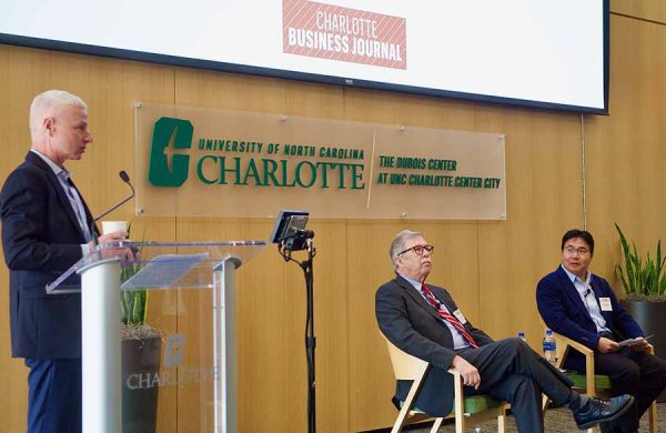 John Connaughton and Childress Klein Center for Real Estate's Yongqiang Chu spoke at the Charlotte Business Journal Economic Outlook event, moderated by CBJ editor Robert Morris.