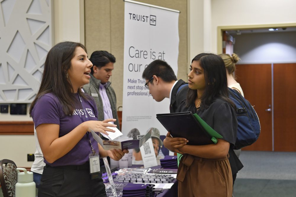 Belk College of Business student and Truist recruiter at the Financial Services Career Fair