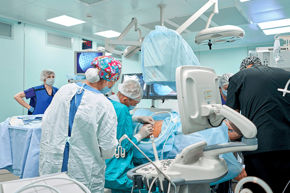 Adobe stock of surgeons performing kidney surgery by Alexander Lupin